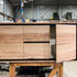Timber wall hung vanity with black features, drawer and cupboards