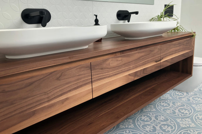 Walnut timber vanity with an open shelf and drawers
